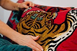 Create hotel luxury at home 3 Tiger cushion detail